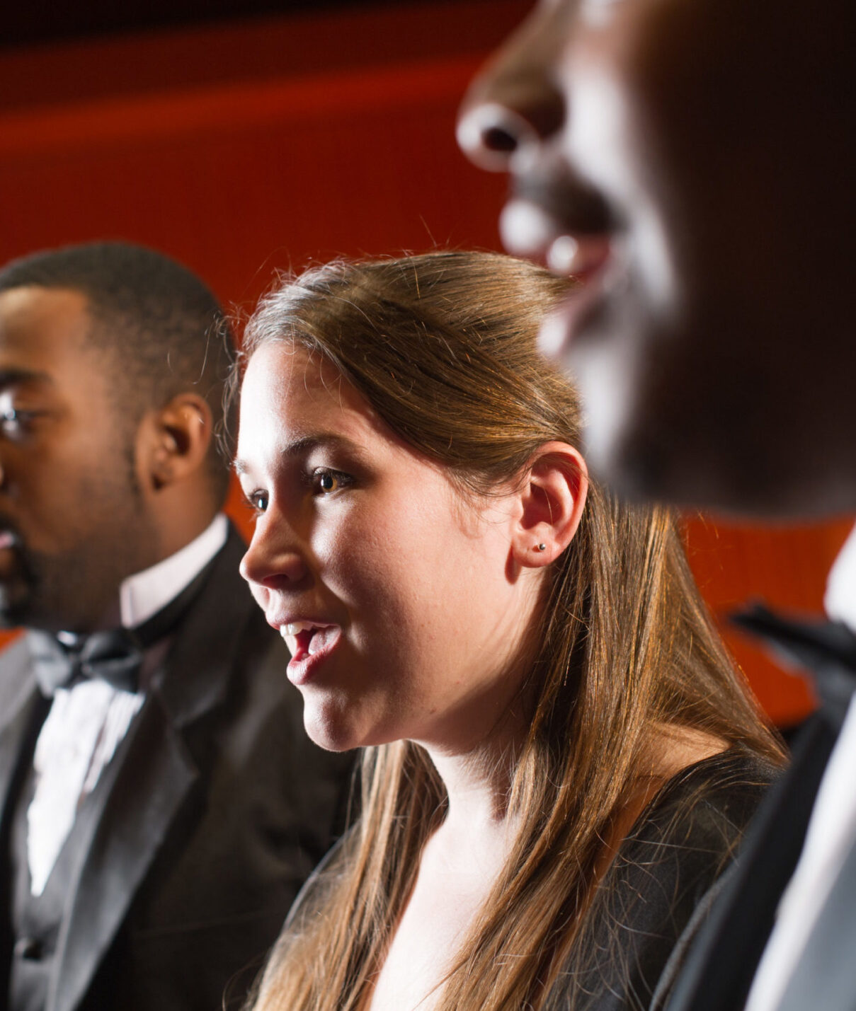 Choir students singing together.