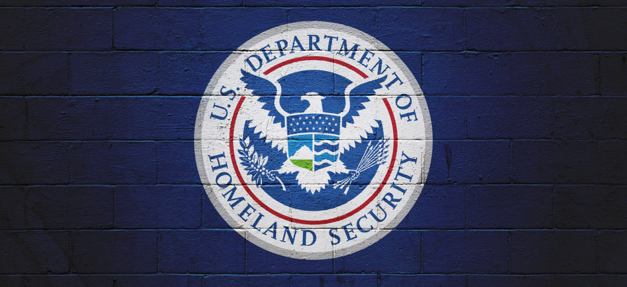 DHS Flag painted on a wall.