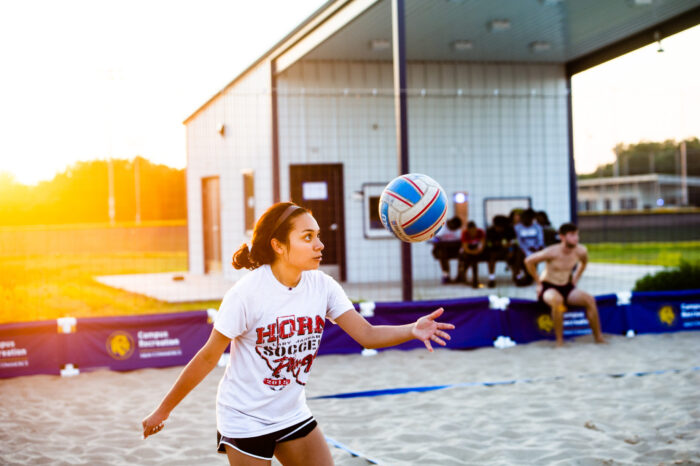 Student playing volleyball