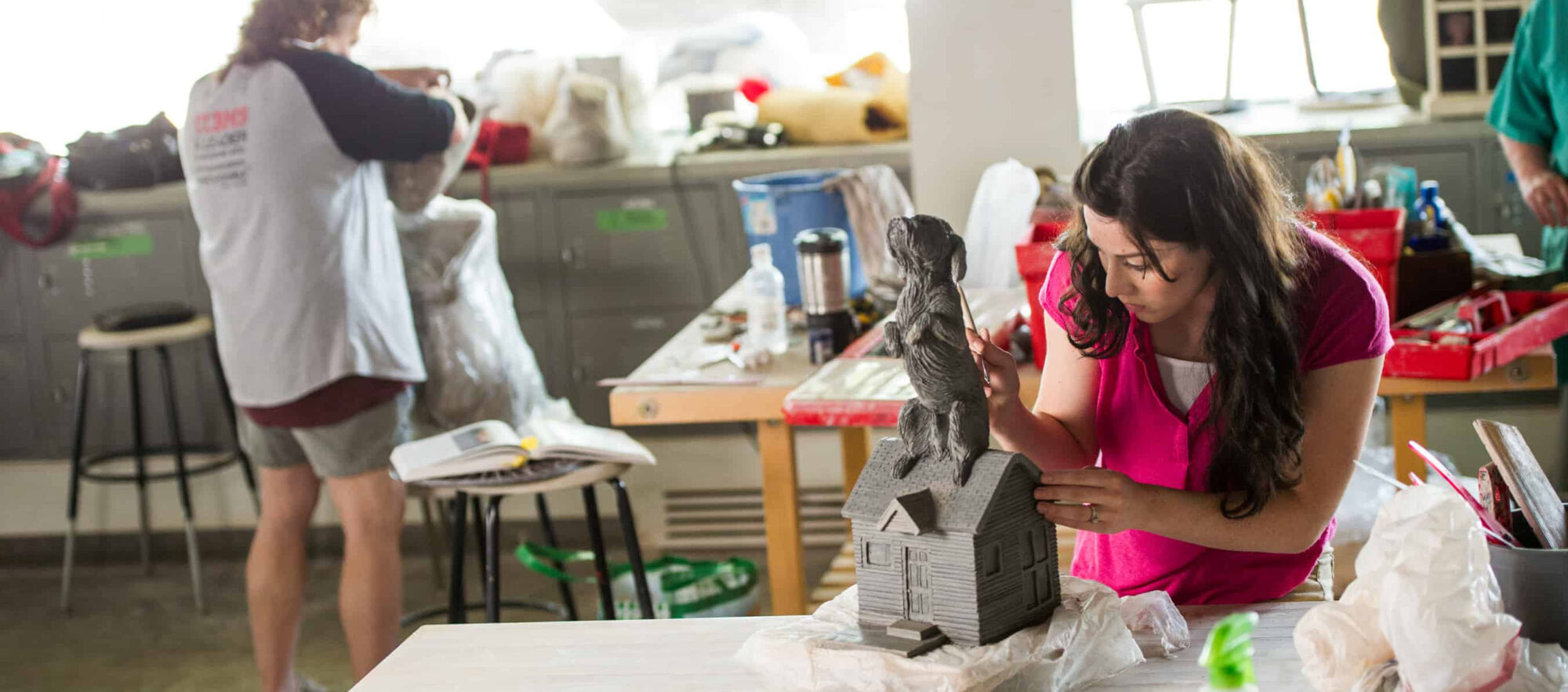 ETAMU student creating an art piece in the art lab.
