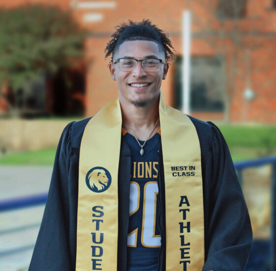 Dominique Ramsey in graduation attire.