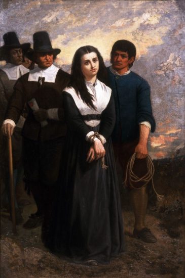 A painting scene depicts a woman with long dark hair, dressed in black and white, standing with her hands clasped. Behind her are three solemn men in 17th-century attire, one holding a coil of rope. The background is a cloudy sky, adding a somber mood.