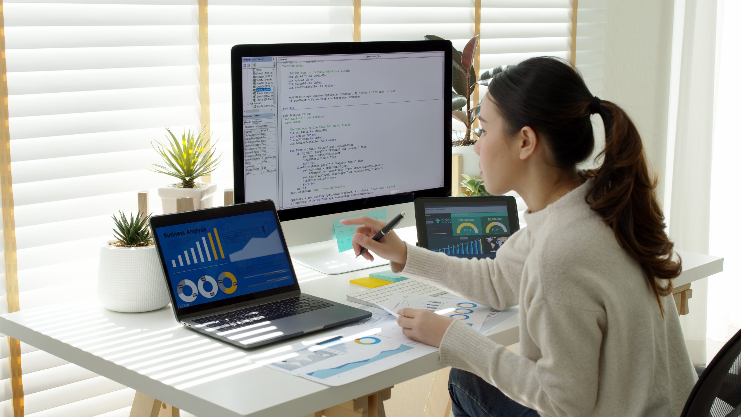 Asia young business woman sit busy at home office desk work code on desktop PC reskill upskill for job career remote self test IT deep tech ai design skill online html text for cyber security.