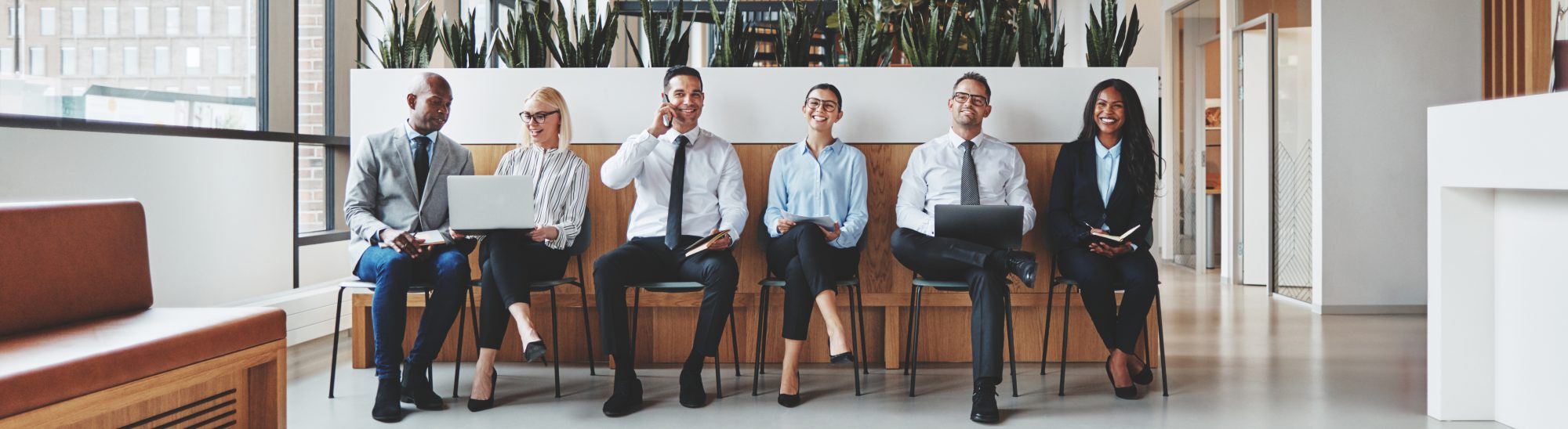Group of business people waiting together in an office