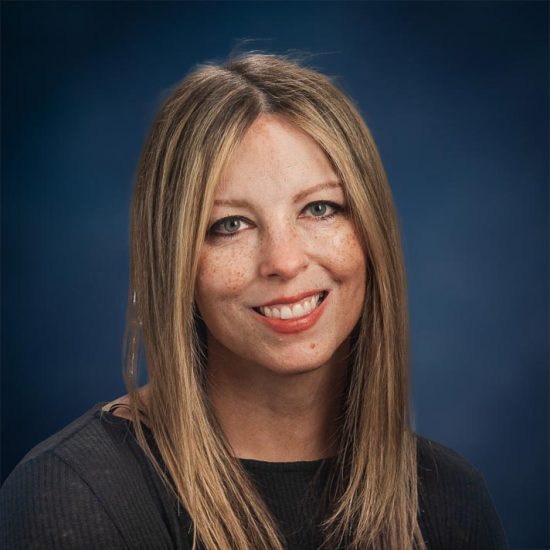 A woman smiling