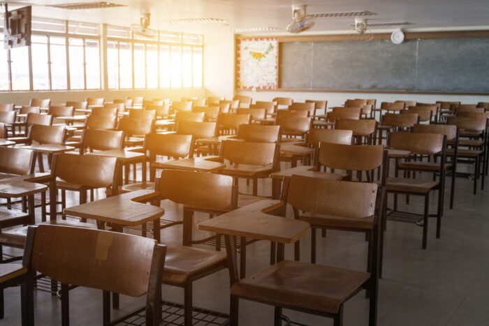 A classroom full of desks, without students.