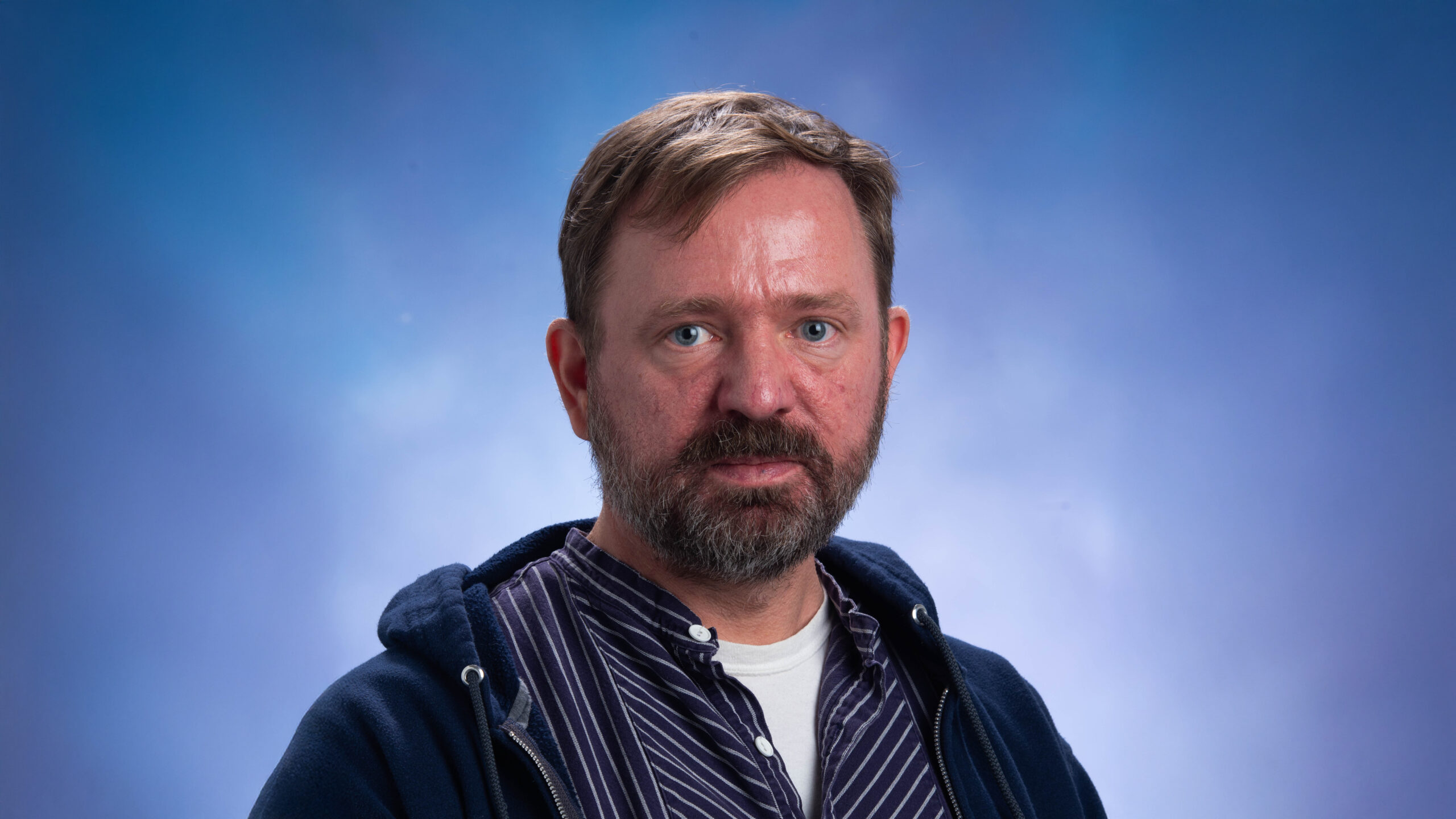 A headshot photo of a person