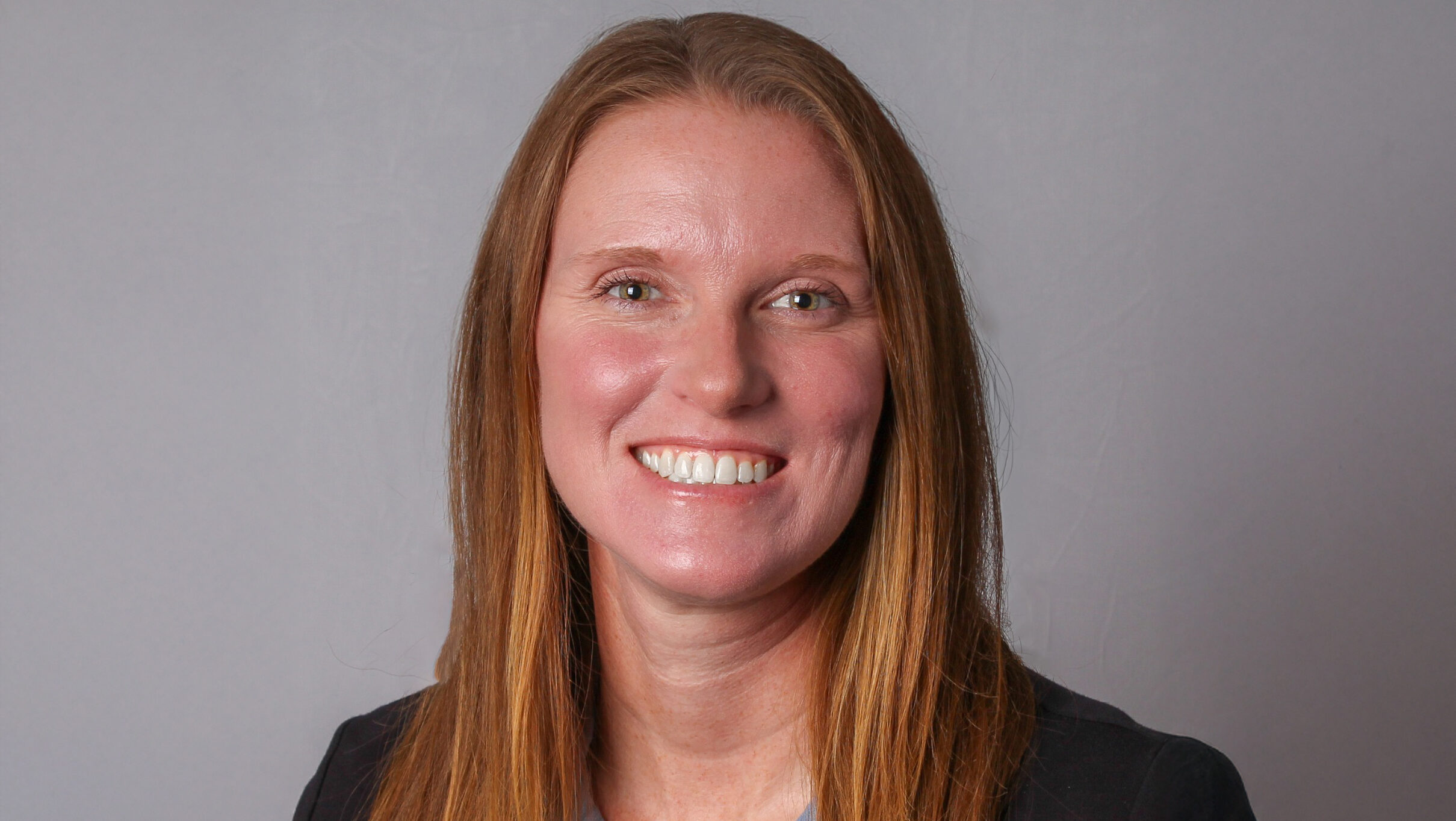 A headshot photo of a person.