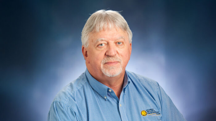 A headshot photo of a person