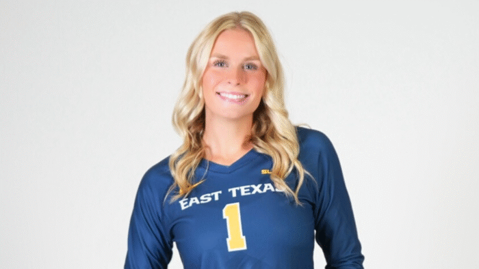 A headshot photo of a volleyball player in uniform.
