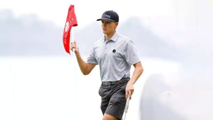 A golfer on a course.